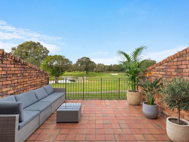 Top floor golf course retreat with panoramic views