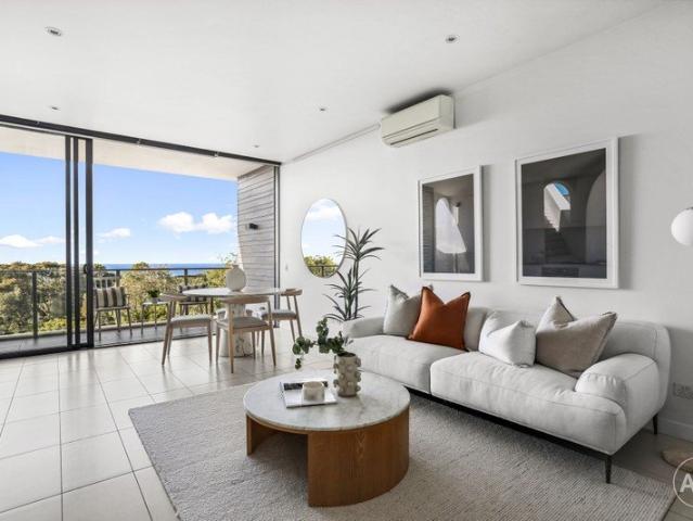 Top Floor East Facing Apartment With Water & Golf Course Views