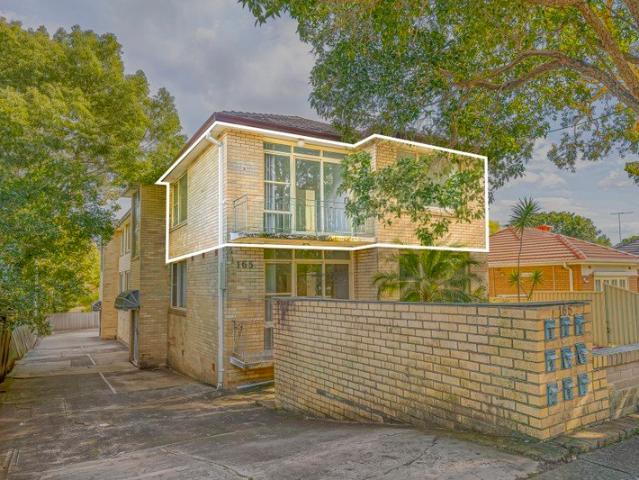Top floor, front facing residence sitting in super rare price point