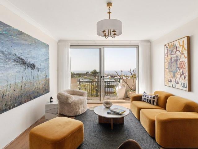 Top floor home with ocean views and lock up garage