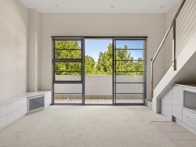 Top floor home in contemporary 'Alex' building