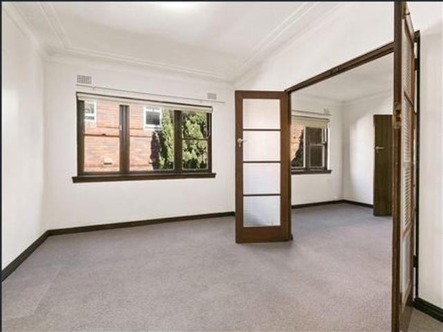 Top Floor Large Two Bedroom Unit with Balcony