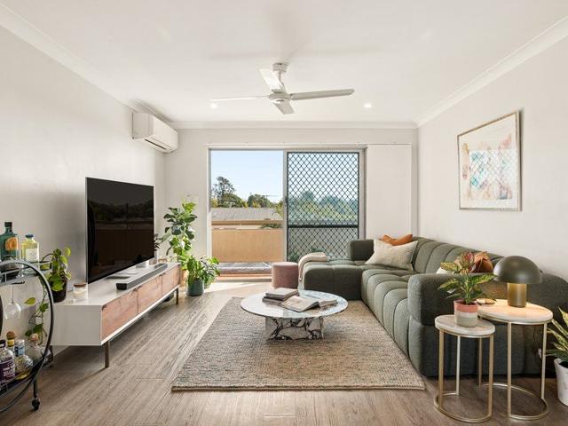 Top floor living, renovated throughout with uninterrupted views