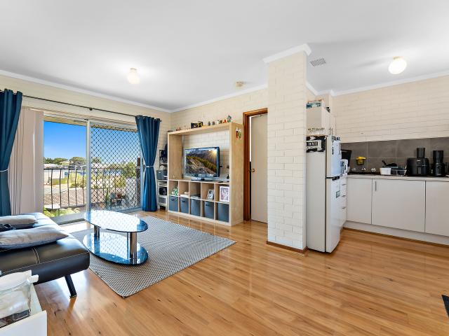 Top floor living & the perfect entry into the market!