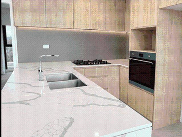 Top Floor Living with an Expansive Wraparound Balcony