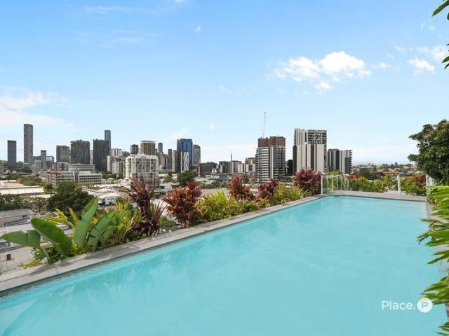 Top Floor Living with Elevated Views in the Heart of West End