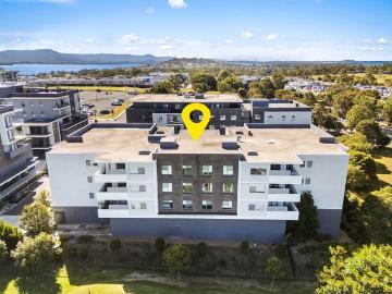 Top Floor Living with Spacious Balcony & Unmatched Convenience in the Heart of Shellharbour