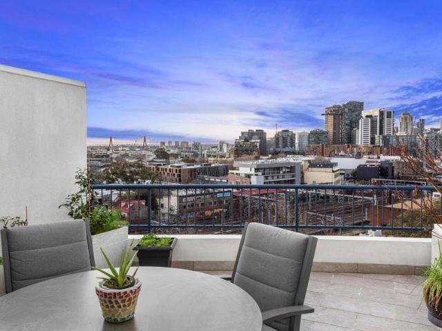 Top Floor Living With Sweeping City Views