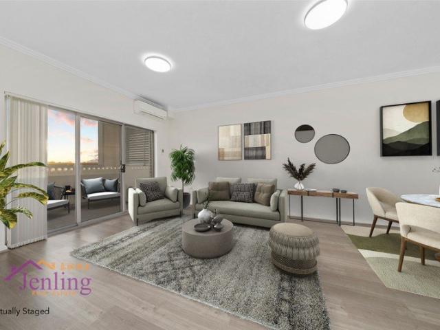 Top Floor Living with Sweeping District Views