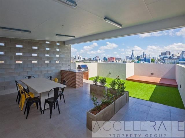 Top Floor Living with Park Views in a Boutique Windsor Complex
