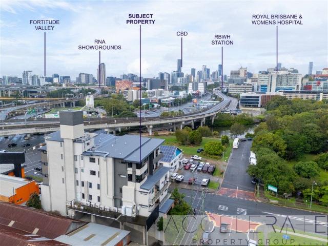 Top Floor Living with Park Views in a Boutique Windsor Complex