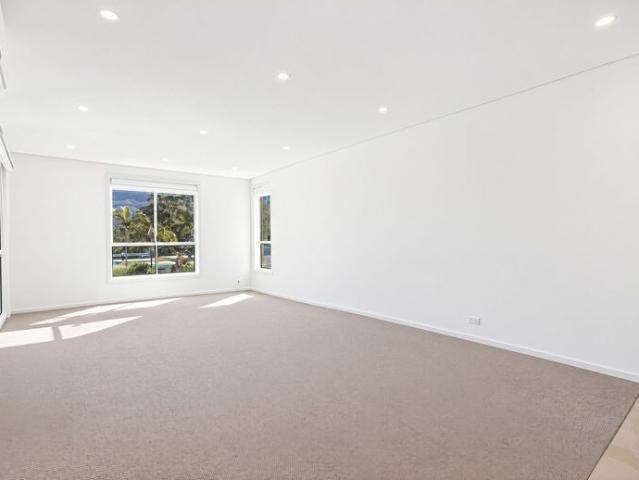 Top Floor Living with Wraparound Views