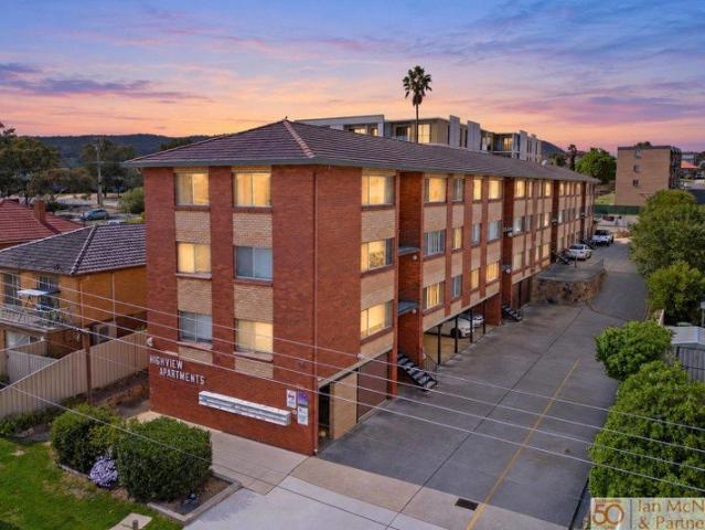 Top Floor Living with Views & Convenience