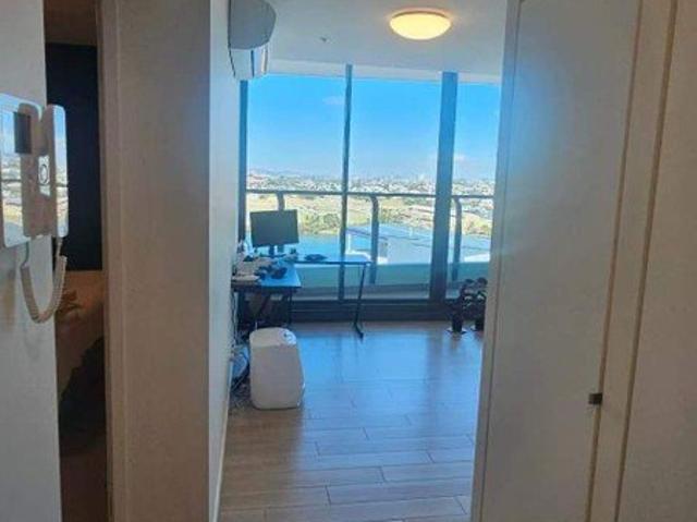 Top Floor Modern Furnished Apartment with River Views | 1 Bed, 1 Bath, 1 Car
