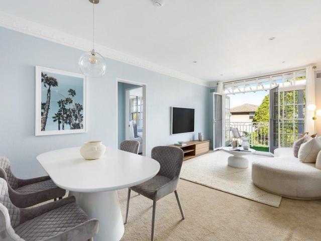 Top Floor Serenity In A Coastal Village Setting, Boutique Style On A Tranquil Tree Lined Avenue!