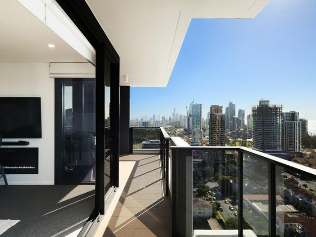 Top Floor Sky Home Capturing Sweeping Ocean and City Views