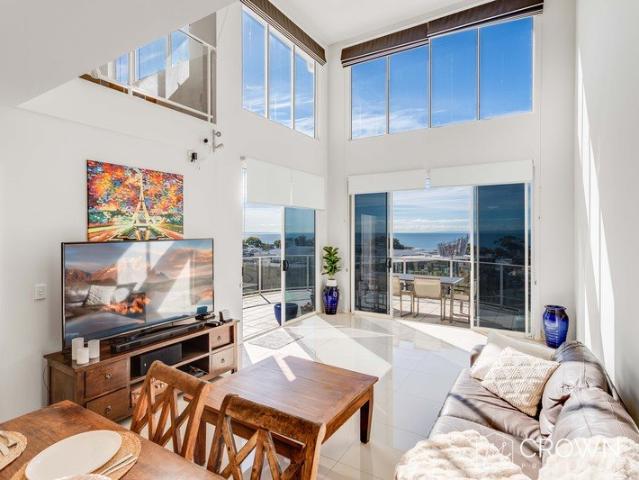 Top Floor Penthouse Living with Captivating Views Watermark North