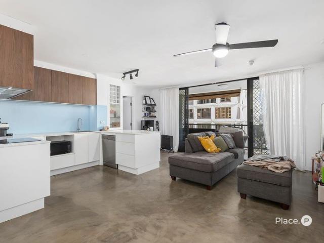 Top Floor Renovated Apartment with Expansive Outdoor Living on New Farm Fringe