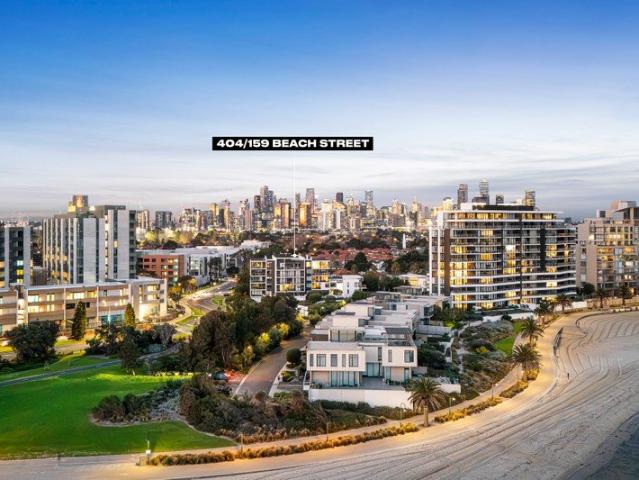 Top Floor Waterfront Living with Panoramic Bay & City Views