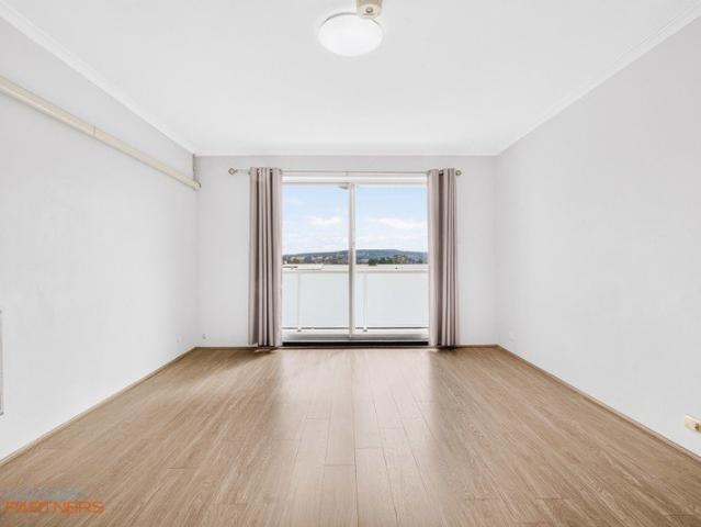 Top floor updated two bedroom apartment close to amenities