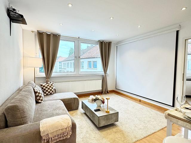 Top location! Stunning city apartment | Cinema screen | WiFi