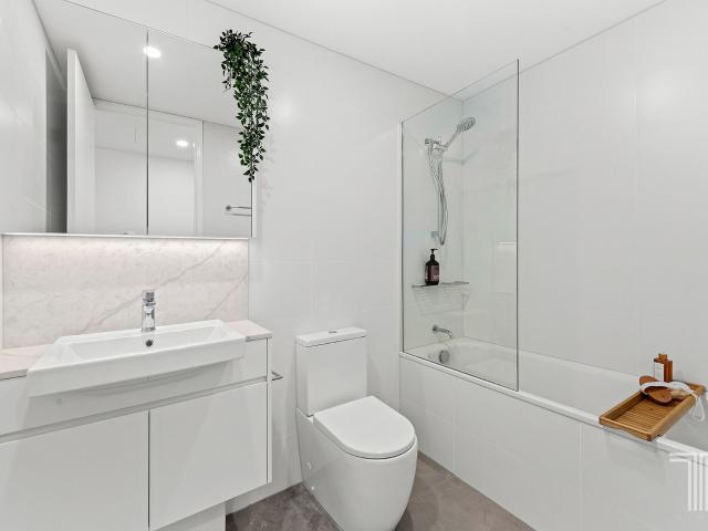 Top Level Apartment Living Without the Penthouse Price Positioned in Vibrant Fish Lane