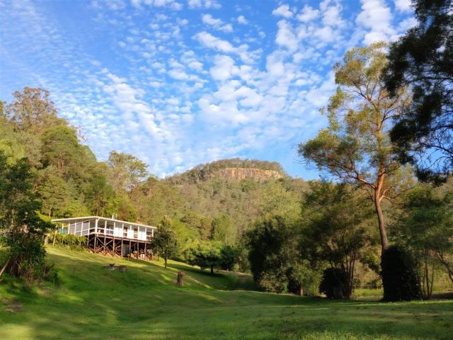 TOP QUALITY OFF GRID HOME ON TWO MANICURED ACRES WITH EXCEPTIONAL VIEWS