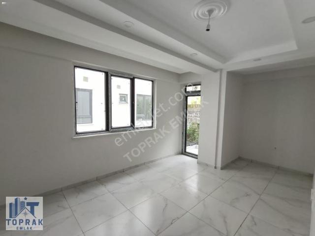 Toprak Emlak'tan Ayrı Mutfaklı,balkonlu 1+1 Sıfır Apart Daire