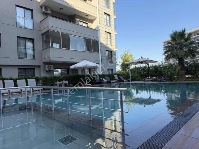 Torbalı İzban Yakını Havuzlu Güvenlikli Sitede Kiralık 1+1 Daire