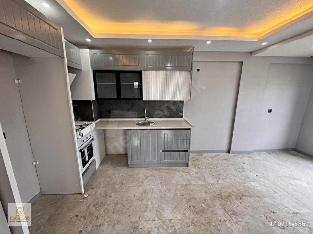 TORBALI'DA İZBAN MEVKİ 1+1 55 M2 YERDEN ISITMA LÜX SIFIR DAİRE
