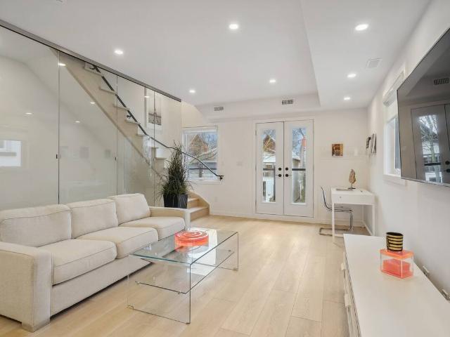 Toronto Furnished Loft for Rent Contemporary 2 Bed, 1 Bath with West Facing Balconies, Air Conditioning, and Office Area
