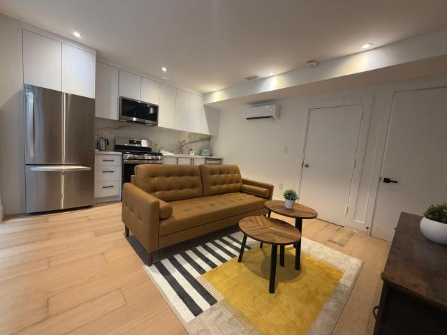 Toronto Furnished Lower Duplex for Rent Charming 2 Bed, 1.5 Bath with South Facing and Hardwood Flooring