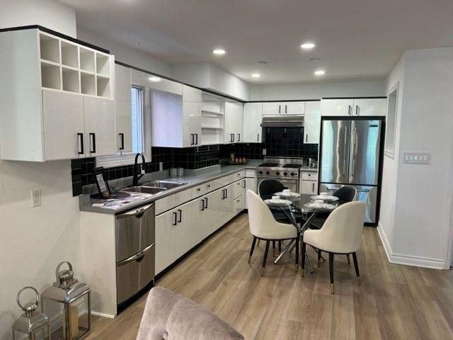 Toronto House for Rent in Lawrence Park North Impressive 3 Bedroom Plus Den, 2.5 Bathroom with an Open Concept Layout, Cozy Fireplaces, and Chef Kitchen