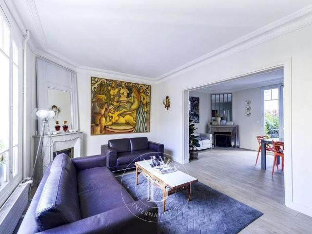 Tout savoir sur cette maison dans le quartier Billancourt–Rives de Seine, à Boulogne Billancourt
