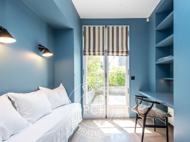 Tout savoir sur cette maison dans le quartier Ile de la Jatte Parc d'Orléans, à Neuilly sur Seine