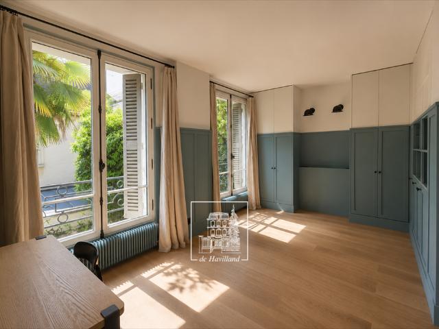 Tout savoir sur cette maison dans le quartier Ile de la Jatte Parc d'Orléans, à Neuilly sur Seine
