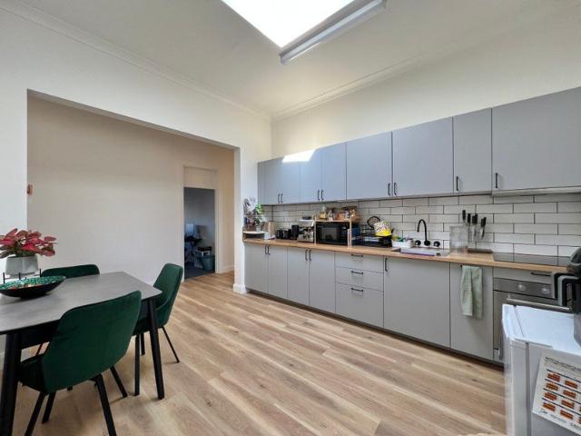TOWN LIVING PLUS INCOME 4 BEDROOM RESIDENCE PLUS 2 x SHOPFRONTS ON STREET LEVEL