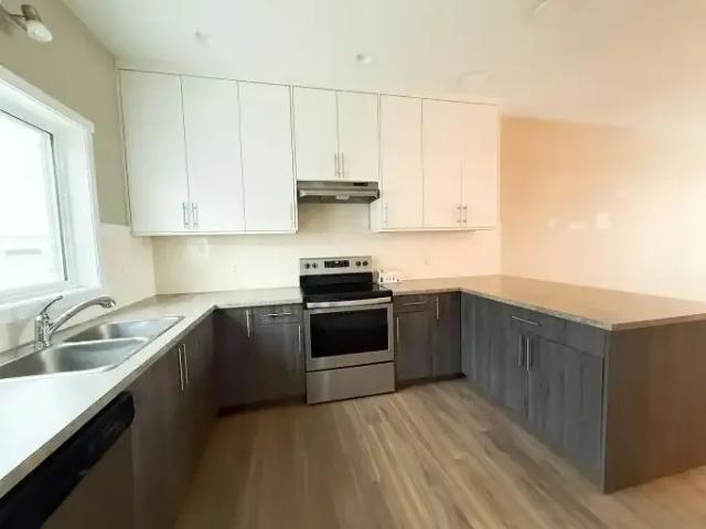 Townhouse 2 Bedroom For Rent Crossfield AB 2000 ES104711540