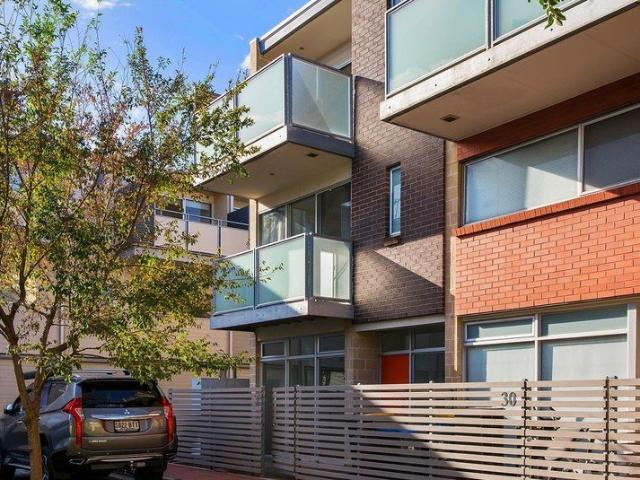 TOWNHOUSE IN THE HEART OF PORT ADELAIDE AMONGST A GATED COMMUNITY