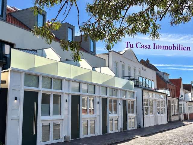 TOWNHOUSE NORDERNEY mit FeWo Studio am Nordbadestrand mit Sonnenbalkon + Garten