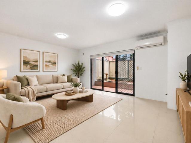 Townhouse Sized Ground Floor Apartment with Enormous Wraparound Courtyard