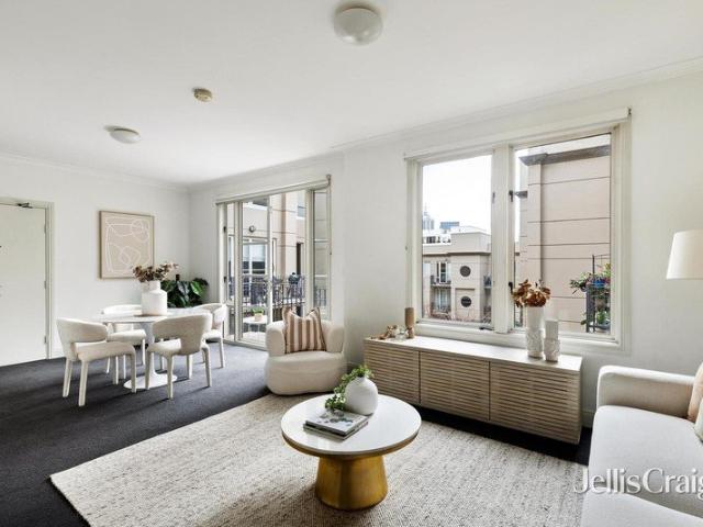 Townhouse style living with city skyline views