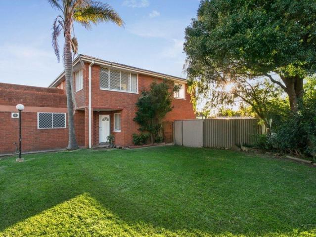 Townhouse With Prized North East Aspect, Tranquil Outlook & Pool in a Quiet Residential Community