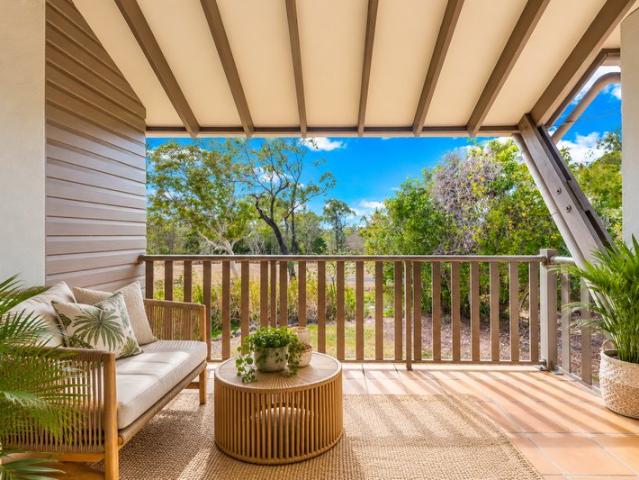 Tropical Top Floor Living with Added Privacy at Laguna Quays