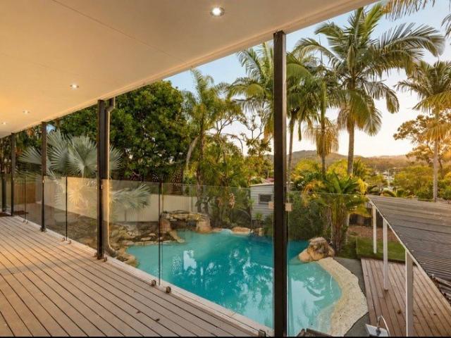 Tropical Family Retreat with Poolside Entertaining