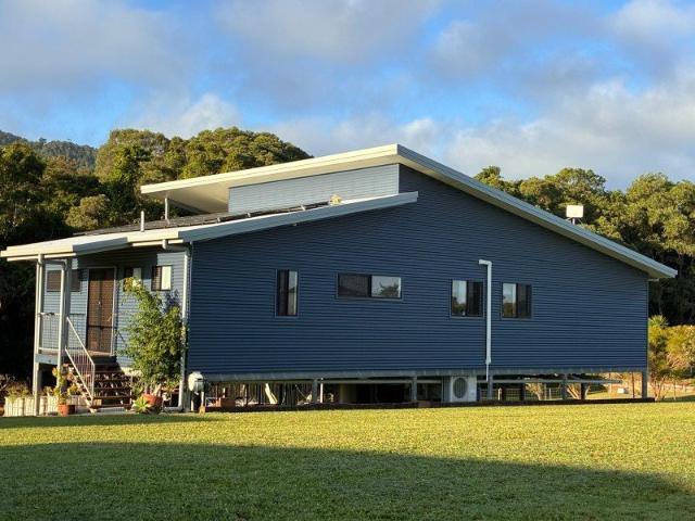 Tropical Lifestyle Acreage with Pool, Mountain Views & Exceptional Sheds