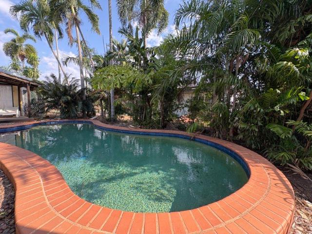 TROPICAL LIVING AT ITS BEST SPACIOUS FAMILY HOME WITH RESORT STYLE POOL!