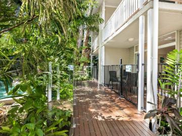 Tropical living just a stones throw from the Palm Cove Esplanade