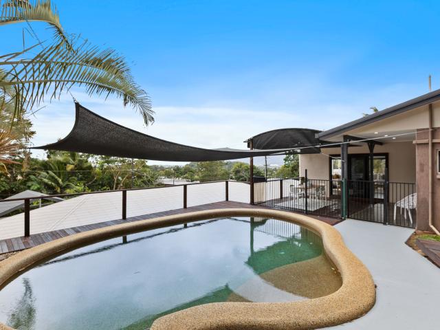 Tropical Living with Pool & Stunning Outlook!