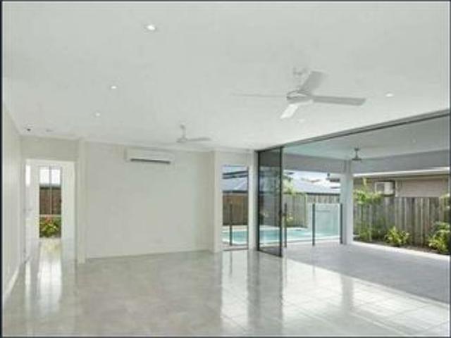 TROPICAL LIVING WITH POOLSIDE APPEAL